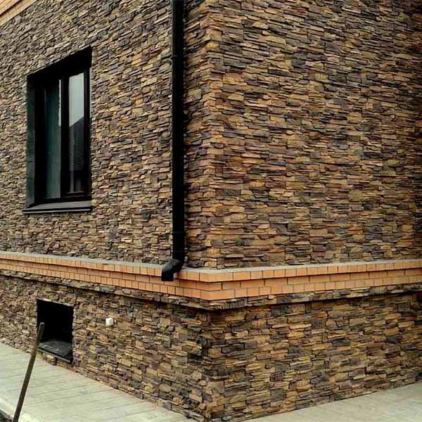 Отделка фасада дома искусственным или натуральным камнем